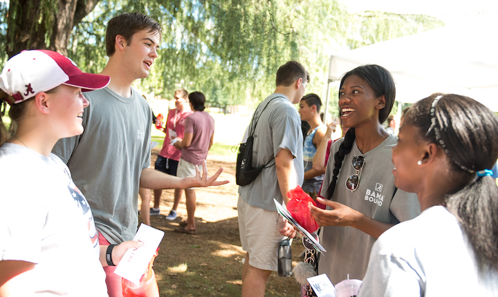 Students talking and smiling